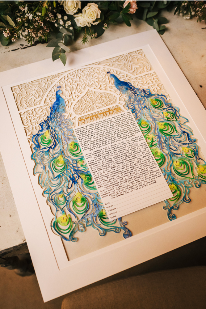 An image of an ancient Ketubah highlighting the intricate artwork.